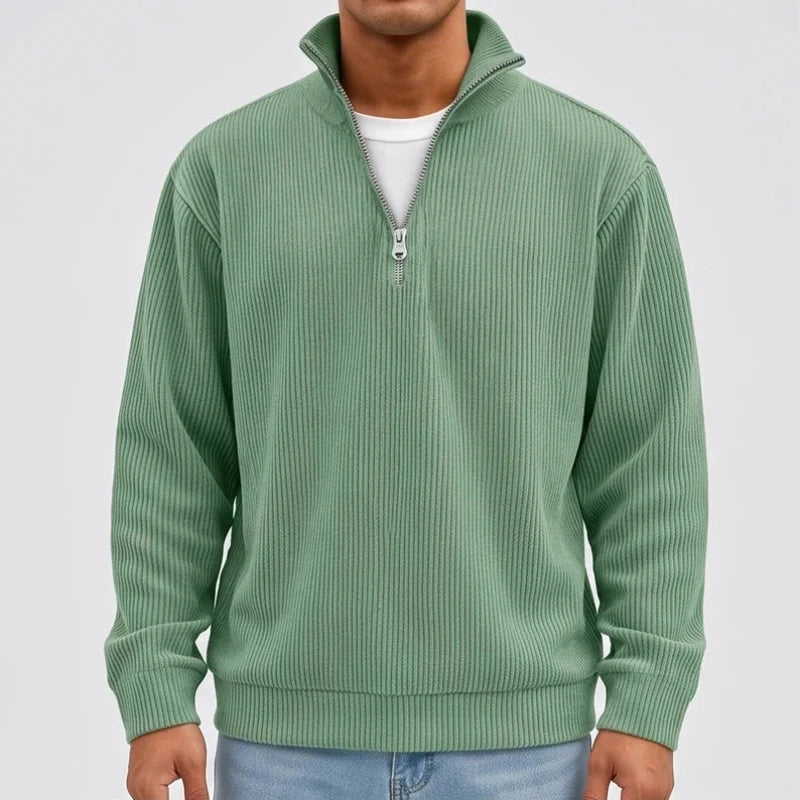 Model wearing Green corduroy pullover in a studio