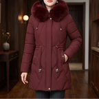 Wine red jacket in a dark wood interior