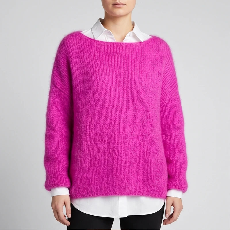 Model wearing rose purple knit pullover in a studio