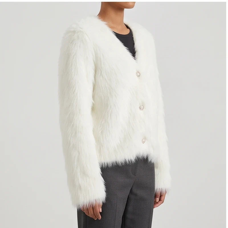 Model wearing white thicken knitted cardigan in a studio - 2