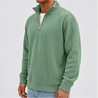 Model wearing Green corduroy pullover in a studio - 2