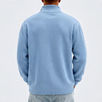 Model wearing Blue corduroy pullover in a studio - 2