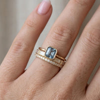 Model wearing Lumière Gold & Sapphire Ring Set Lumière Gold & Sapphire Ring Set close-up - 2