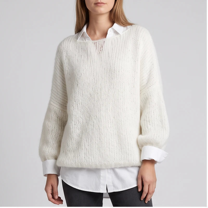 Model wearing White knit pullover in a studio