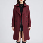 Model wearing Red coat in a studio