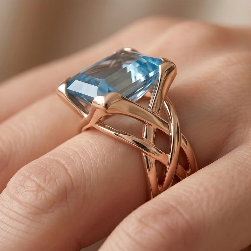 Model wearing Vintage Rose Gold Blue Zirconia Ring Vintage Rose Gold Blue Zirconia Ring close-up - 2
