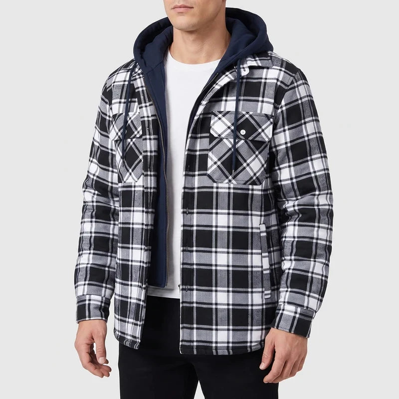 Black vest on an off-gray studio background