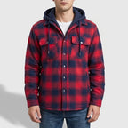 Red vest on an off-gray studio background