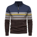 Blue and brown sweater with patterned sleeves on a white background