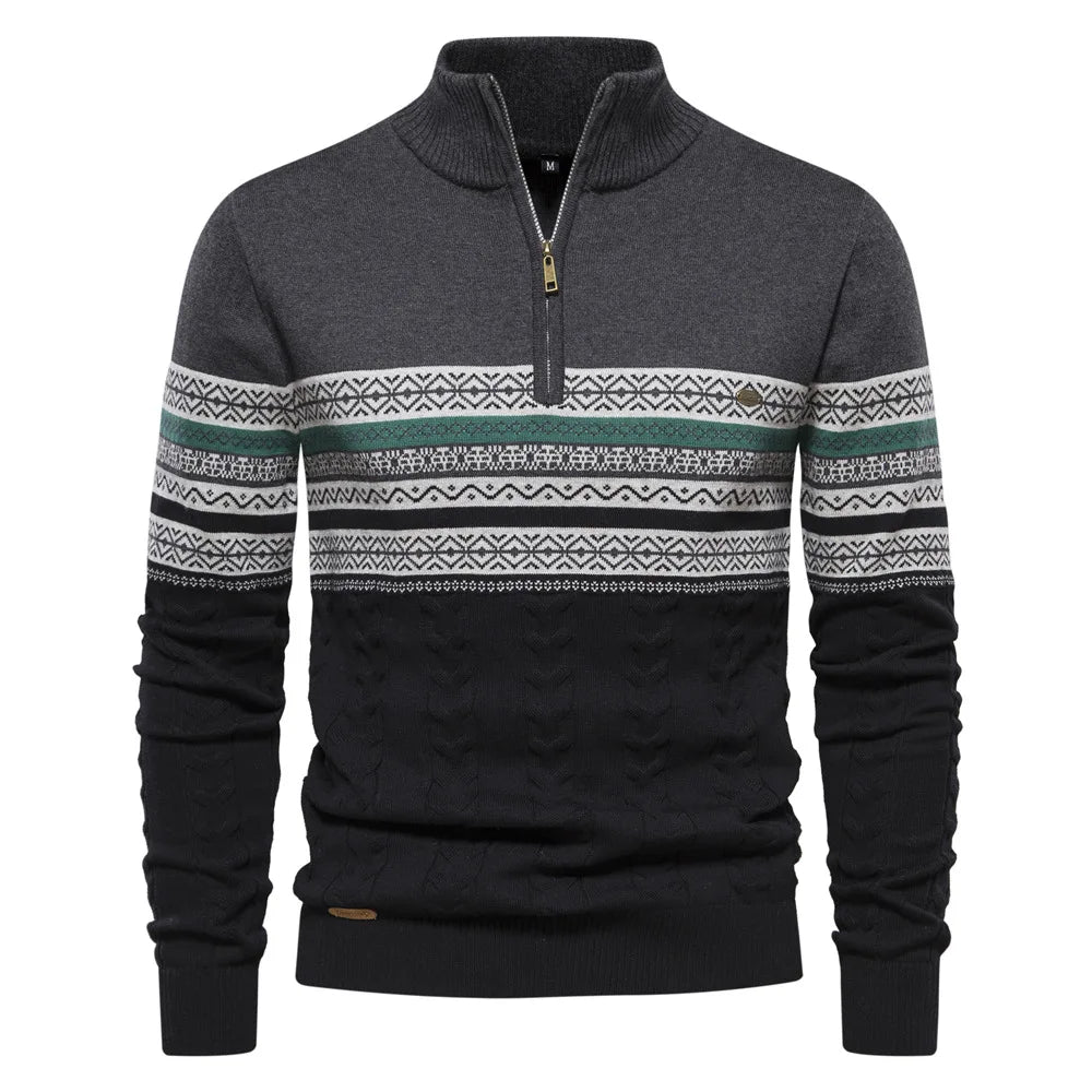 Gray sweater with patterned sleeves on a white background