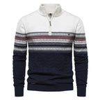 White and navy and white sweater with patterned sleeves on a white background