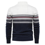White and navy sweater with patterned sleeves on a white background