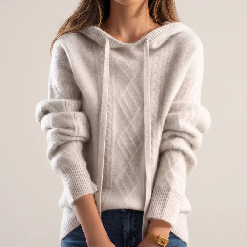 Model wearing Beige knit sweater in a studio
