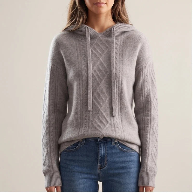 Model wearing Gray knit sweater in a studio