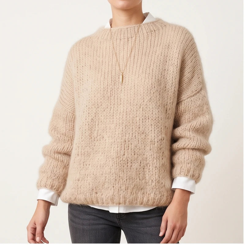 Model wearing khaki knit pullover in a studio