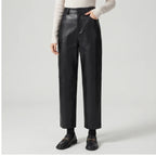 Black leather pants on an off-gray studio background - 2