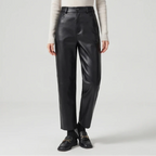 Black leather pants on an off-gray studio background - 3