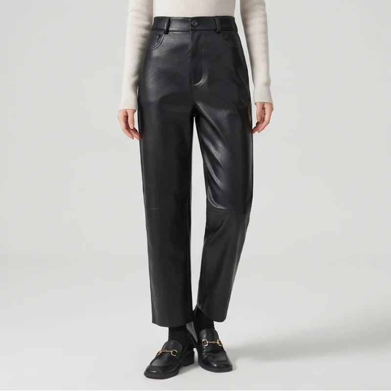Black leather pants on an off-gray studio background - 3