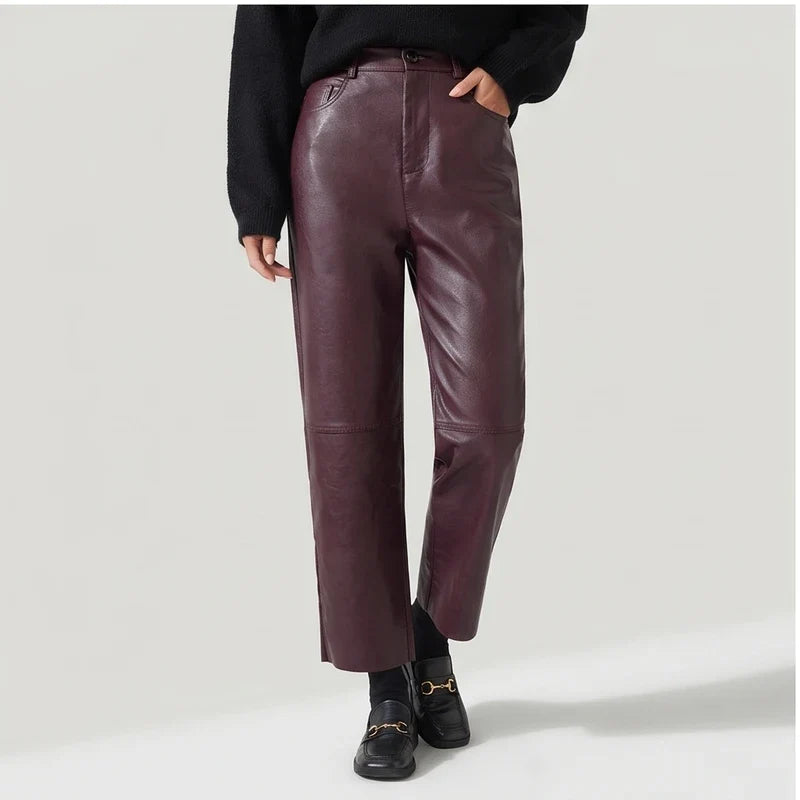 Burgundy leather pants on an off-gray studio background - 3