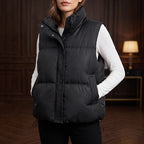 Black cotton vests in a dark wood interior