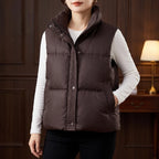 Coffee cotton vests in a dark wood interior
