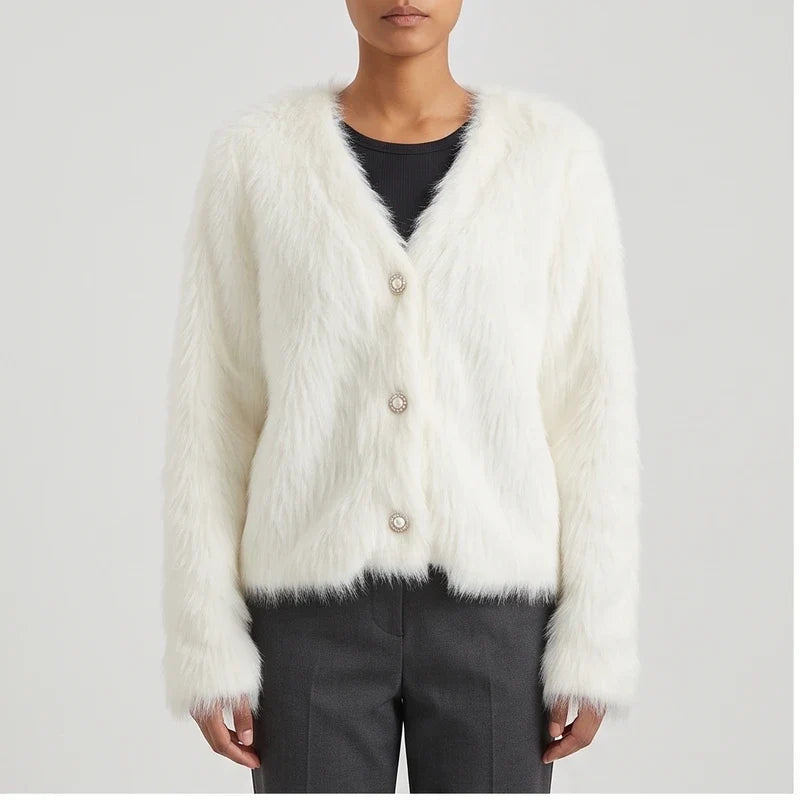 Model wearing white thicken knitted cardigan in a studio