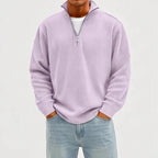 Model wearing Purple corduroy pullover in a studio