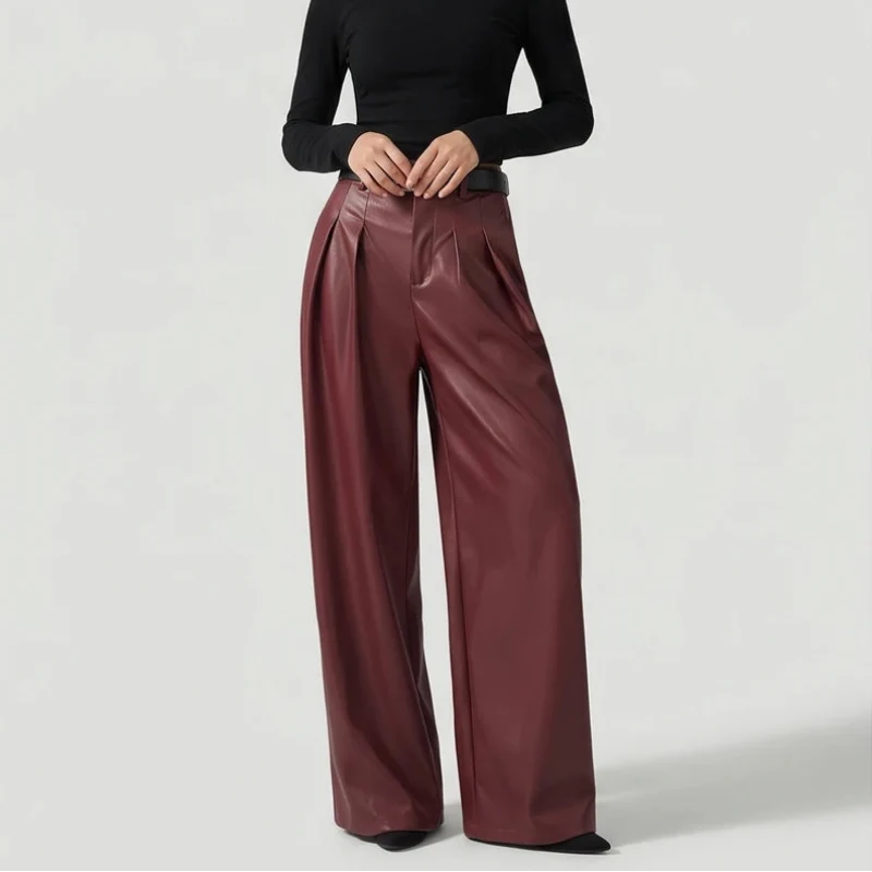 Red leather pants on an off-gray studio background - 2