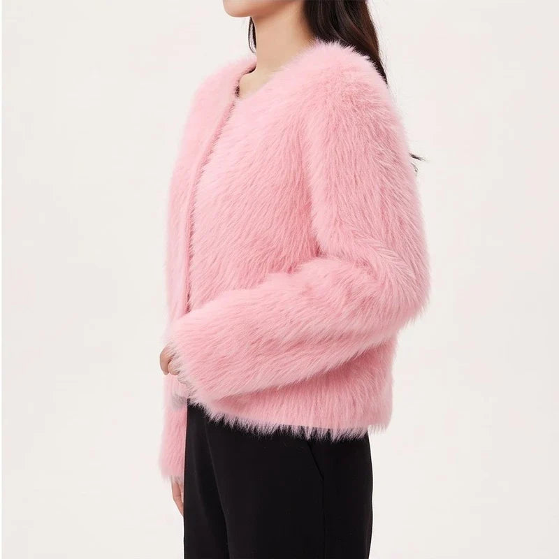 Model wearing Pink cashmere cardigan in a studio - 3