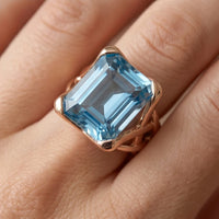 Model wearing Vintage Rose Gold Blue Zirconia Ring Vintage Rose Gold Blue Zirconia Ring close-up - 3