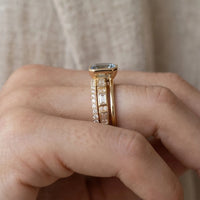 Model wearing Lumière Gold & Sapphire Ring Set Lumière Gold & Sapphire Ring Set close-up - 3