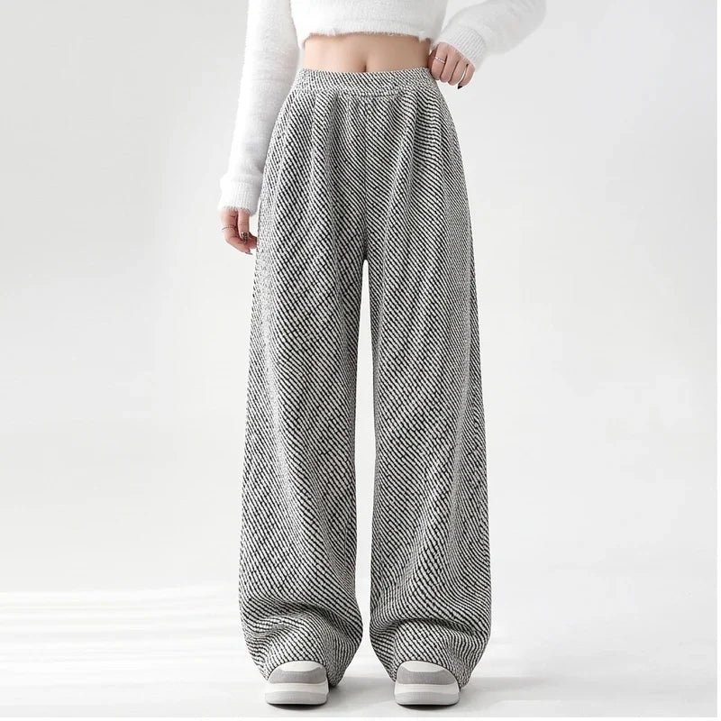 Model wearing Light Gray knit apparel in a studio