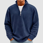 Model wearing Navy corduroy pullover in a studio