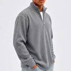 Model wearing Gray corduroy pullover in a studio - 2