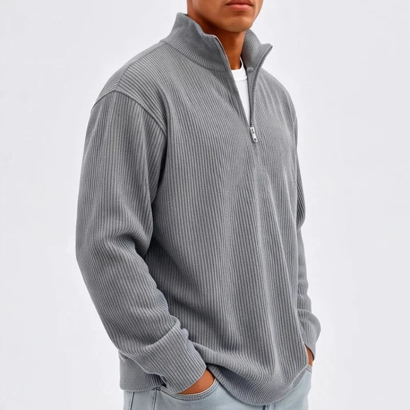 Model wearing Gray corduroy pullover in a studio - 2