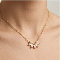 Model wearing Omelia Crystal Leaf Necklace Omelia Crystal Leaf Necklace close-up - 3