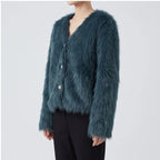 Model wearing black knitted cardigan in a studio - 3