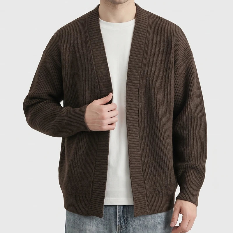 Brown knit cardigan on an off-gray studio background - 2