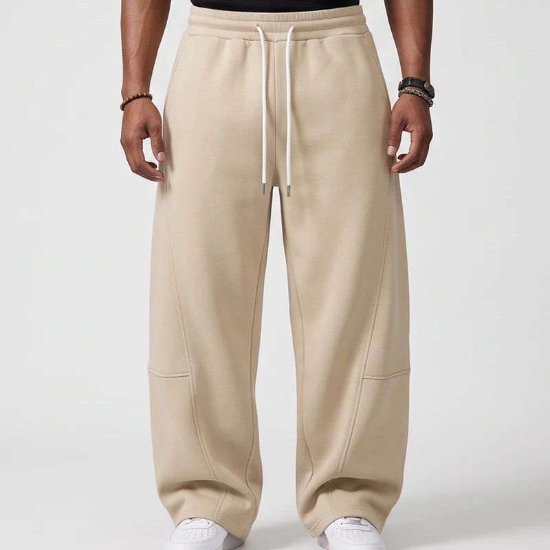 Beige apparel on an off-gray studio background - 2