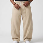 Beige apparel on an off-gray studio background - 3