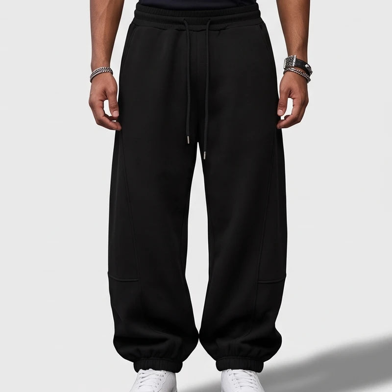 Black apparel on an off-gray studio background - 2