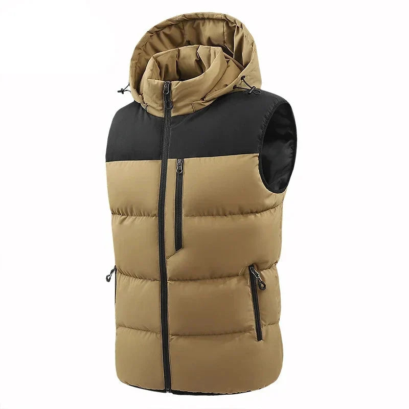 Two-tone tan and black puffer vest with a full zipper, hood, and multiple zippered pockets, displayed flat on white.