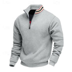 Gray quarter-zip sweatshirt with a partially open zipper revealing a black layer and a striped collar in red, black, and beige.