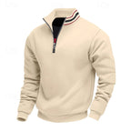 Cream quarter-zip sweatshirt with a black zipper and a high collar featuring red, black, and white stripes.