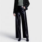 Black leather pants on an off-gray studio background - 2