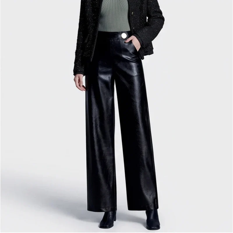 Black leather pants on an off-gray studio background - 2