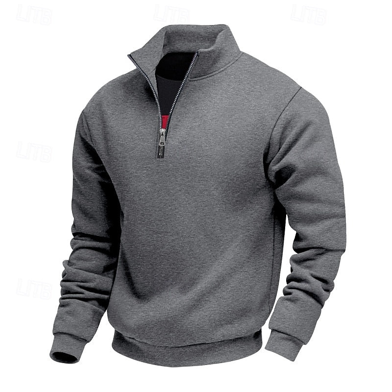 Dark grey heathered sweatshirt featuring a stand-up collar and a visible silver quarter-zip closure with a black pull.