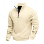 Cream quarter-zip sweatshirt with a black zipper, high collar, and ribbed cuffs and hem, presented on a white background.