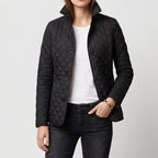 Black jacket on an off-gray studio background - 2