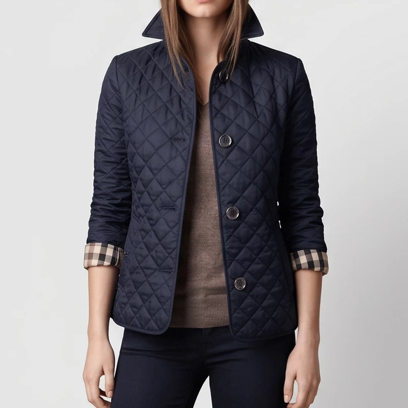 Navy jacket on an off-gray studio background